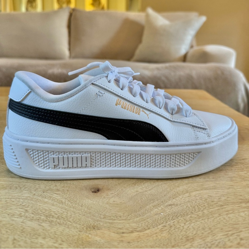 Puma White Sneakers with Black Stripe